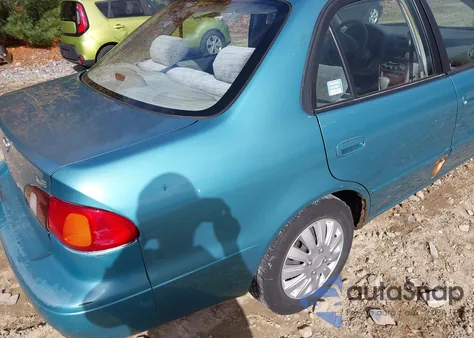1999 Toyota Corolla Le z USA, uszkodzony, nr VIN 2T1BR12E2XC208457
